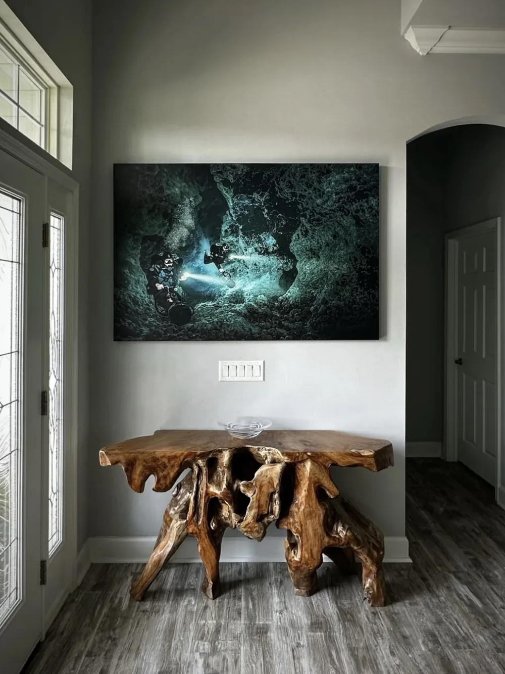 A private cave shoot printed on aluminum and hung in a home entryway