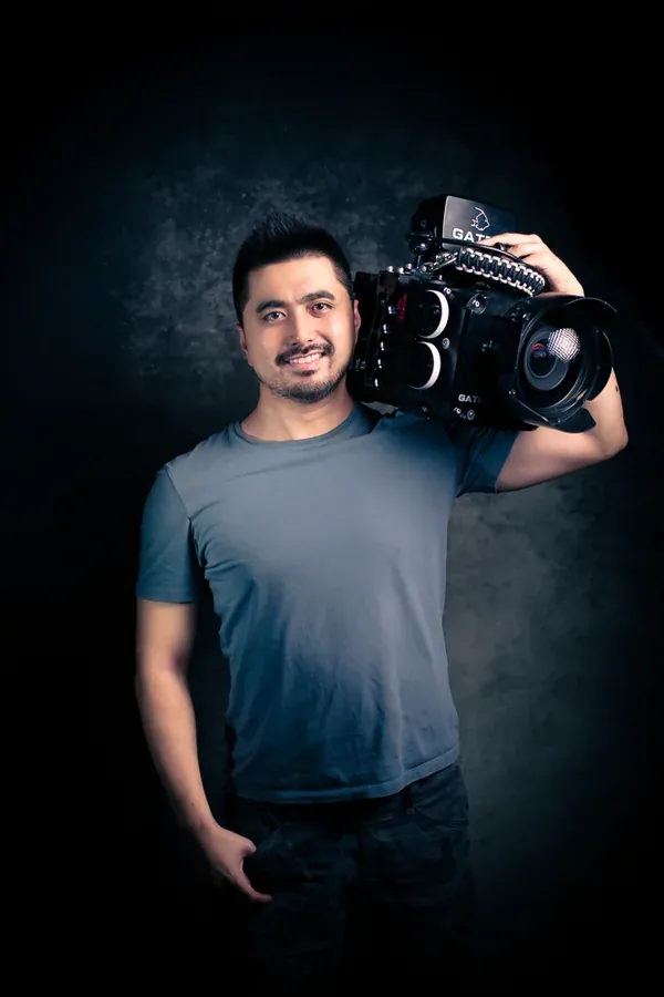 Fan Ping holding an underwater cinema camera